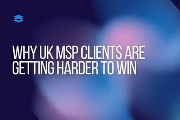 UK business professional reviewing MSP service options on laptop in modern London office